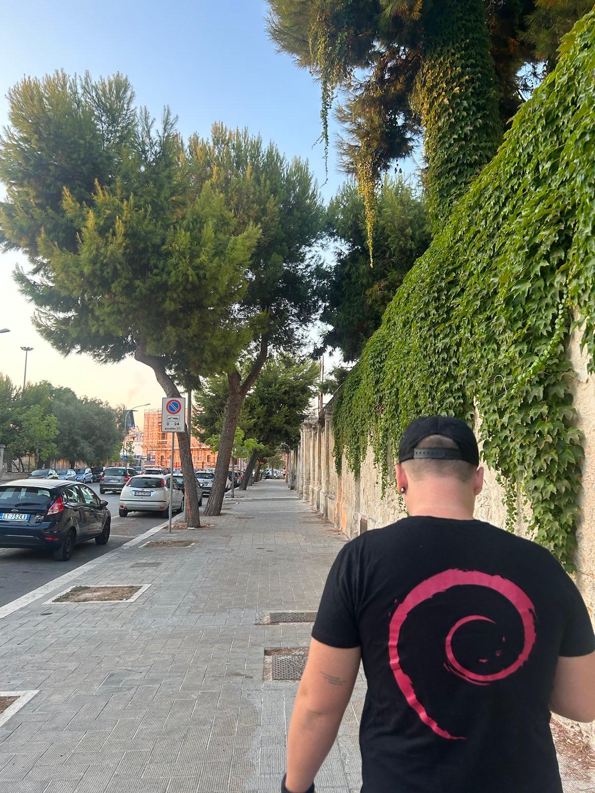 Myself with my Debian T-Shirt in Bari, Italy.